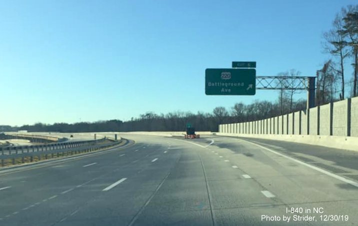 Image of overhead exit ramp signage for US 220/Battleground Avenue on newly opened section of I-840 West/Greensboro Urban Loop from Lawndale Drive in Dec. 2019, by Strider