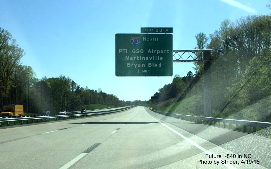 Image of overhead 1-mile advance sign for I-73 North/Bryan Blvd exit on newly opened section of I-840 West/Greensboro Urban Loop, by Strider