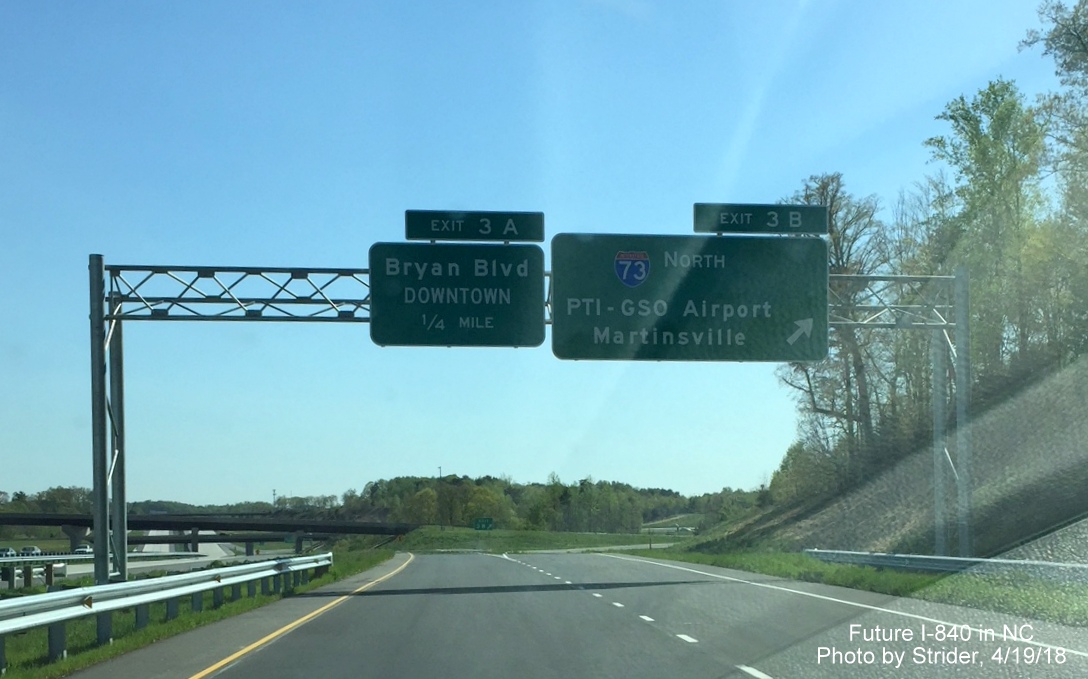 Image of overhead exit signs along C/D ramp from newly opened section of I-840 West/Greensboro Urban Loop, by Strider