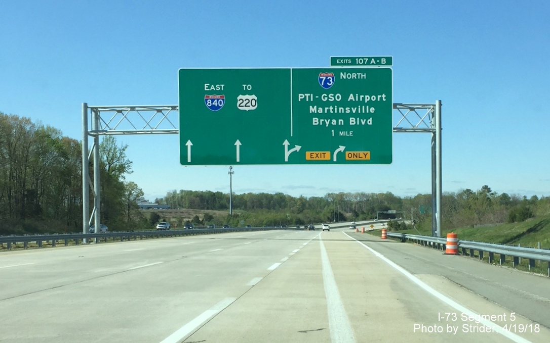 Image of 1 mile advance arrow-per-lane overhead sign on I-73 North/Greensboro Loop put up for newly opened I-840 East section, by Strider