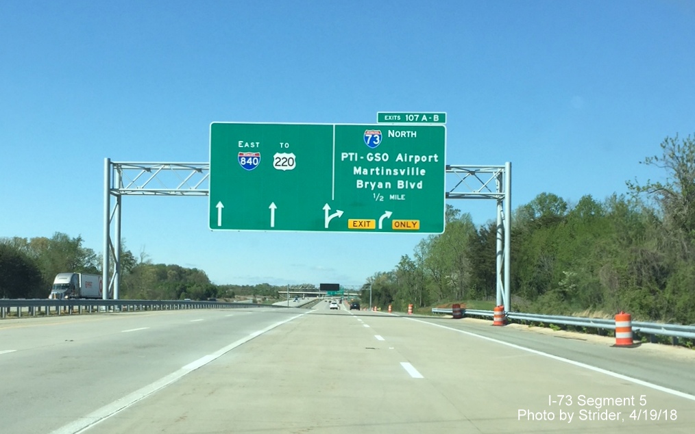 Image of newly placed 1/2 mile advance arrow-per-lane overhead sign on I-73 North/Greensboro Loop for the newly opened I-840 East section to US 220, by Strider