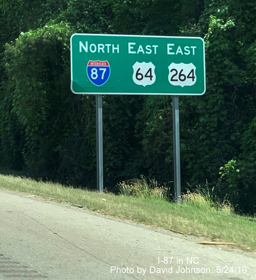 Image of green reassurance marker sign now with I-87 shield replacing I-495 after New Hope Road exit on I-87 North, US 64/264 East in Raleigh, by David Johnson