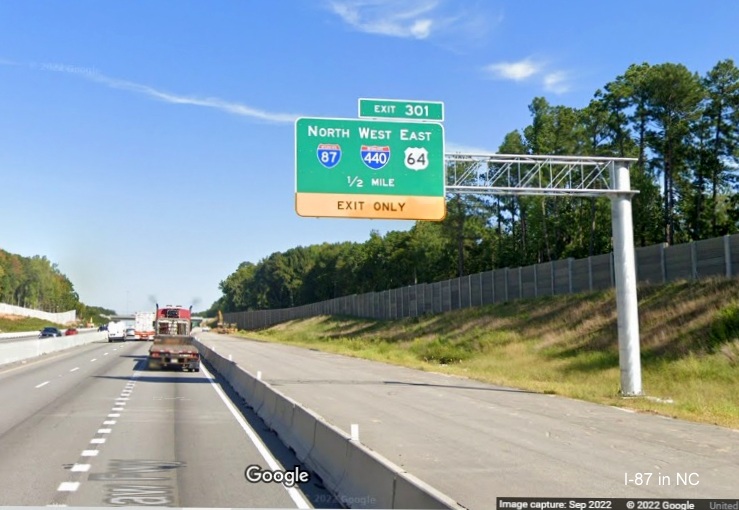 Image of 1/2 mile advance overhead sign for I-87 North/I-440 West/US 64 East exit on I-40 West in Raleigh, Google Maps Street View, September 2022