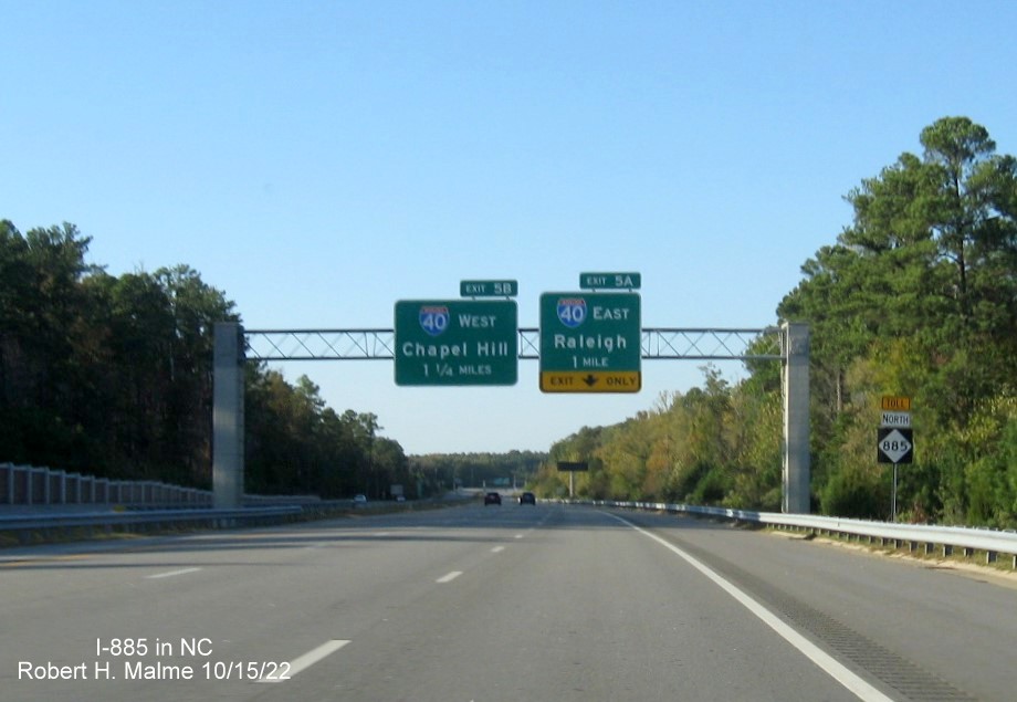 Image of advance overhead signs for I-40 exits on NC 885 North in Research Triangle Park, October 2022