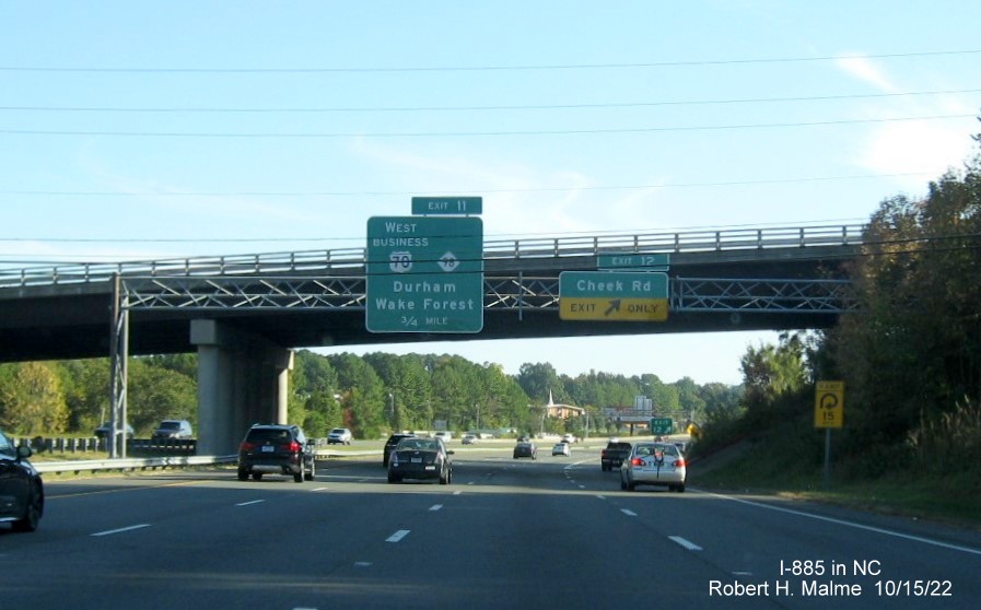 Image of overhead signage at ramp for Cheek Road exit on I-885 South/US 70 East in Durham, October 2022