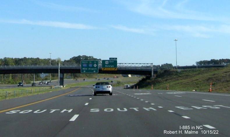 Image of pavement markings approaching the split of South I-885 and East US 70 in Durham, October 2022
