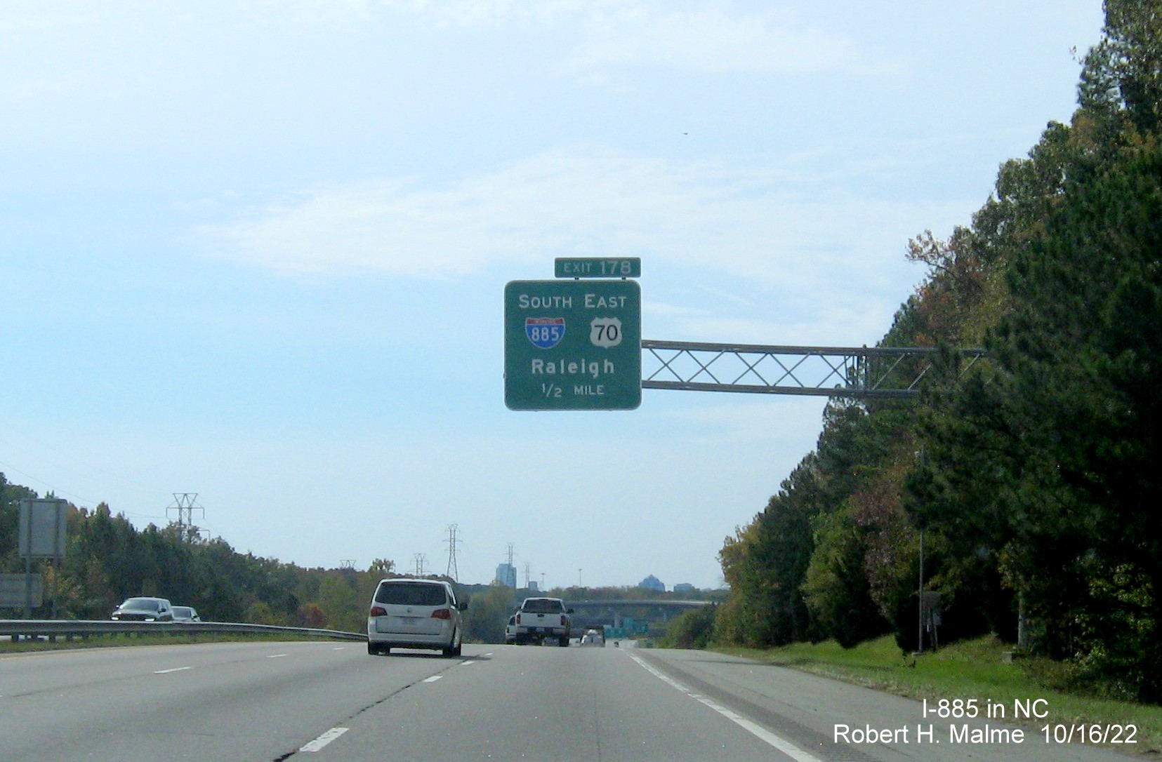 Image of 1/2 mile advance overhead sign for I-885 South/US 70 East exit on I-85/US 15 South in Durham, October 2022