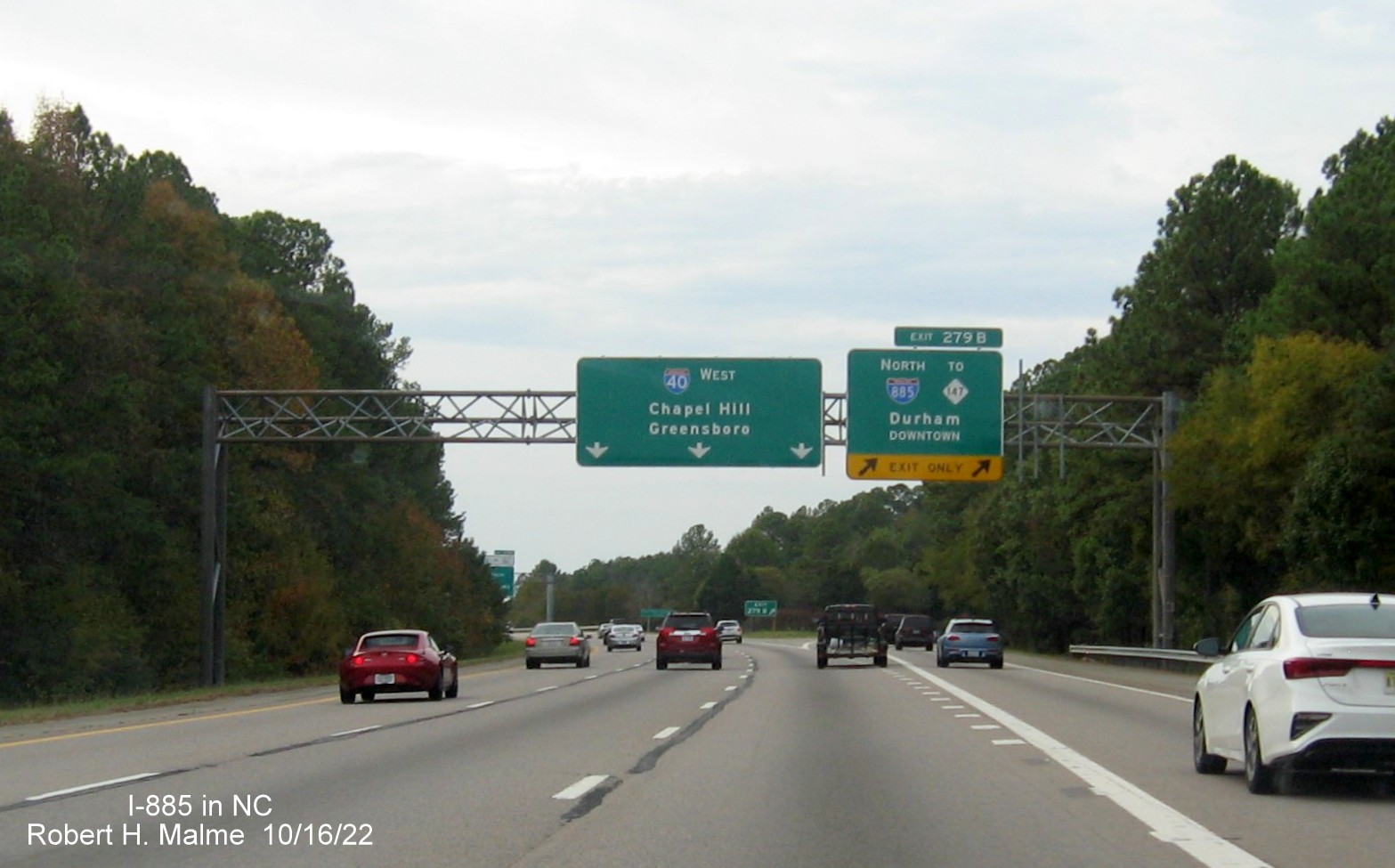 Image of overhead ramp sign for new I-885/Durham Freeway exit on I-40 West in Durham, October 2022