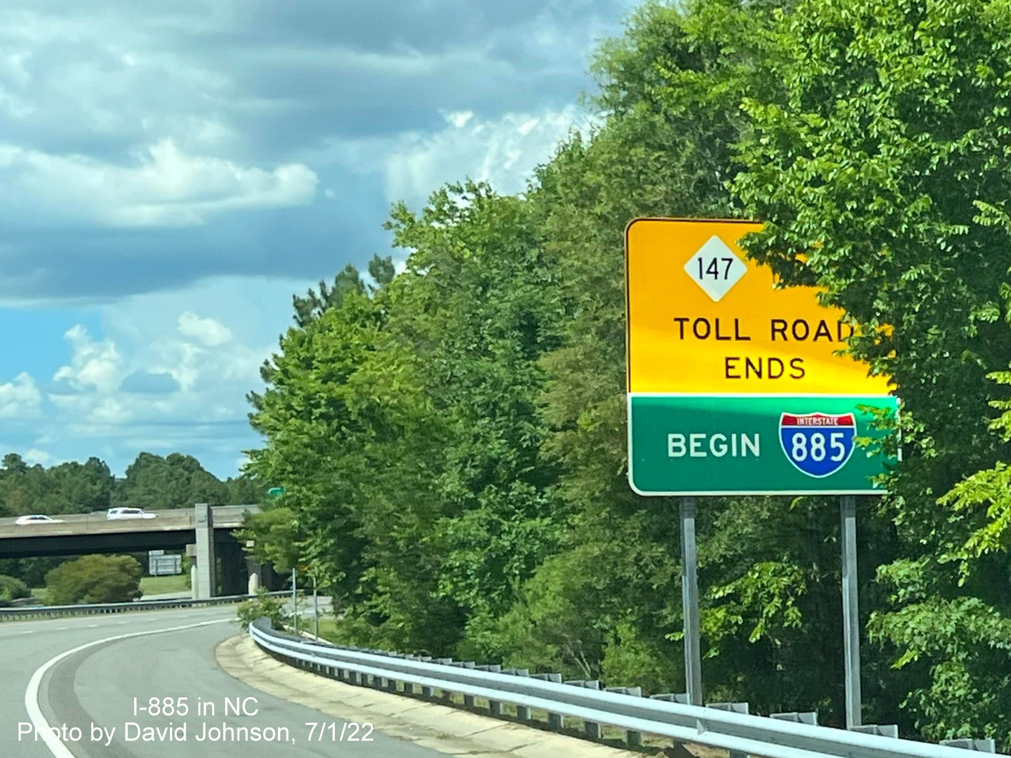 Image of End Toll NC 147/Begin I-885 advisory sign on Durham Freeway north, by David Johnson July 2022
