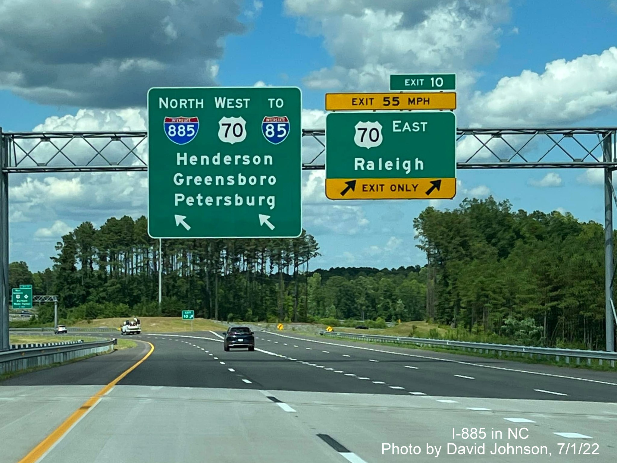 Image of overhaed signage on I-885 North/East End Connector ramp at US 70 East exit, by David Johnson July 2022