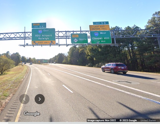 View of overhead signage at ramp for I-40 East at end of I-885 South in Durham, NC 885 South pull through sign moved to the right, Google Maps Street View image, November 2022