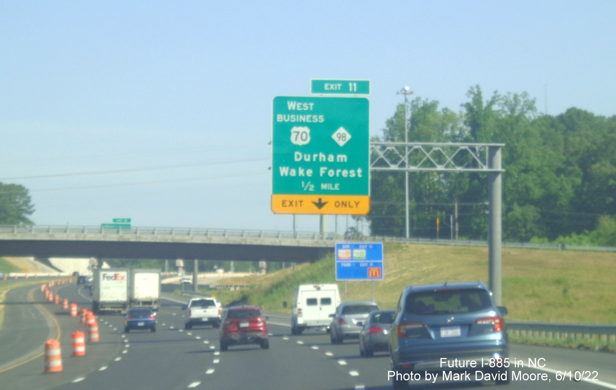 Image of 1/2 mile advance overhead sign for US 70 Business West/NC 98 exit
        on Future I-885 North/US 70 West in Durham, by Mark David Moore June 2022