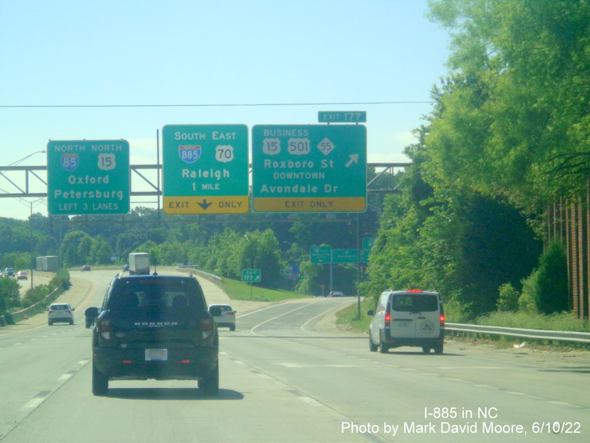 Image of 1 mile a advance overhead sign for new I-885 South/US 70 East exit
        on I-85 North/US 70 East in Durham, by Mark David Moore June 2022