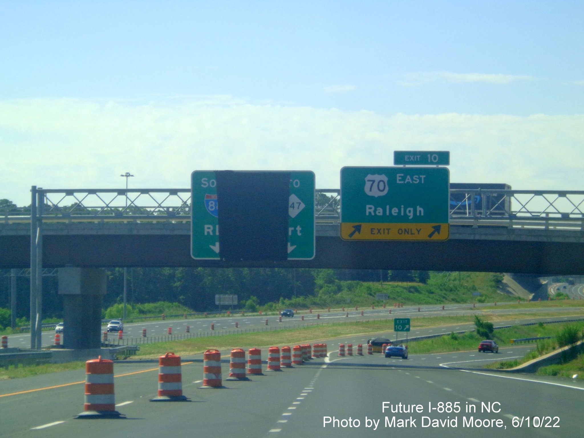 Image of new lane markings for Future I-885 South approaching US 70 East
        exit ramp in Durham, by Mark David Moore June 2022
