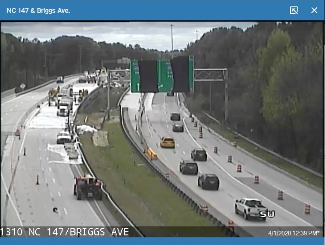 NCDOT traffic camera image of new overhead signage for future East End Connector interchange on NC 147 South in Durham, taken April 1, 2020
