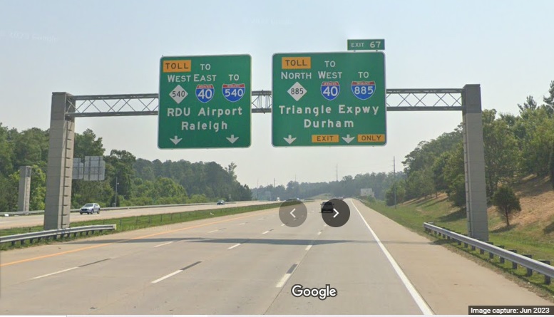 Image of newly modified signage approaching exit ramp for Toll NC 885 North on Toll NC 540 West/Triangle Expressway in Research Triangle Park, Google Maps Street View, June 2023