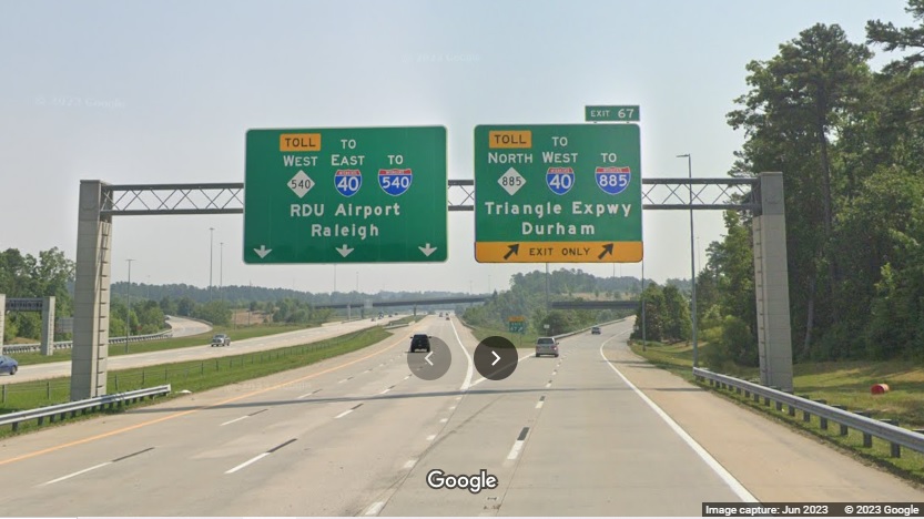 Image of recently modified signage at ramp for beginning of Toll NC 885 North on Toll NC 540 West in Research Triangle Park, Google Maps Street View, June 2023