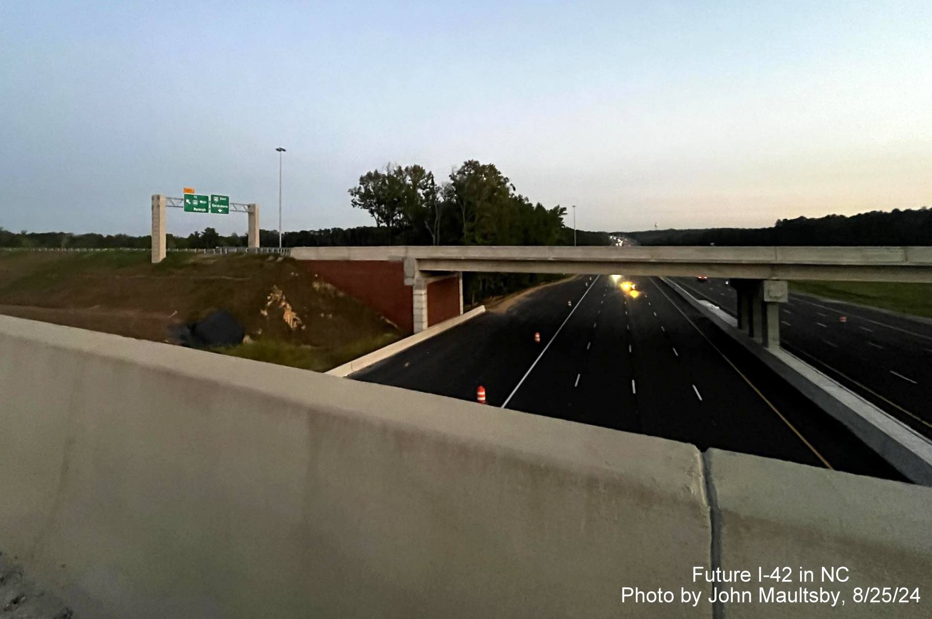 Image of new I-42 shield on overhead ramp sign along currently unopened 
       section of NC 540 Turbine interchange, by John Maultsby, August 2024