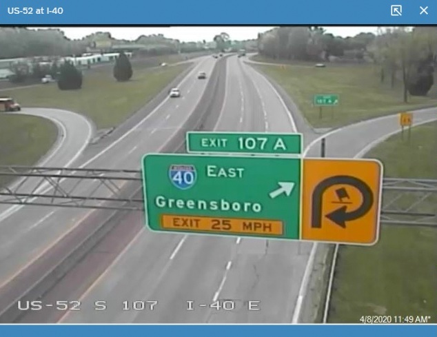 Traffic camera image of newly placed exit sign for I-40 East on I-285/US 52 North in Winston-Salem, with US 311 shield now absent, put up in April 2020