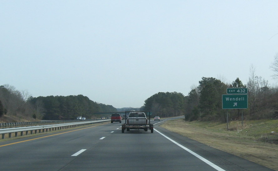 Photo of exit signage for Wendell interchange with US 64/264 in January 2010